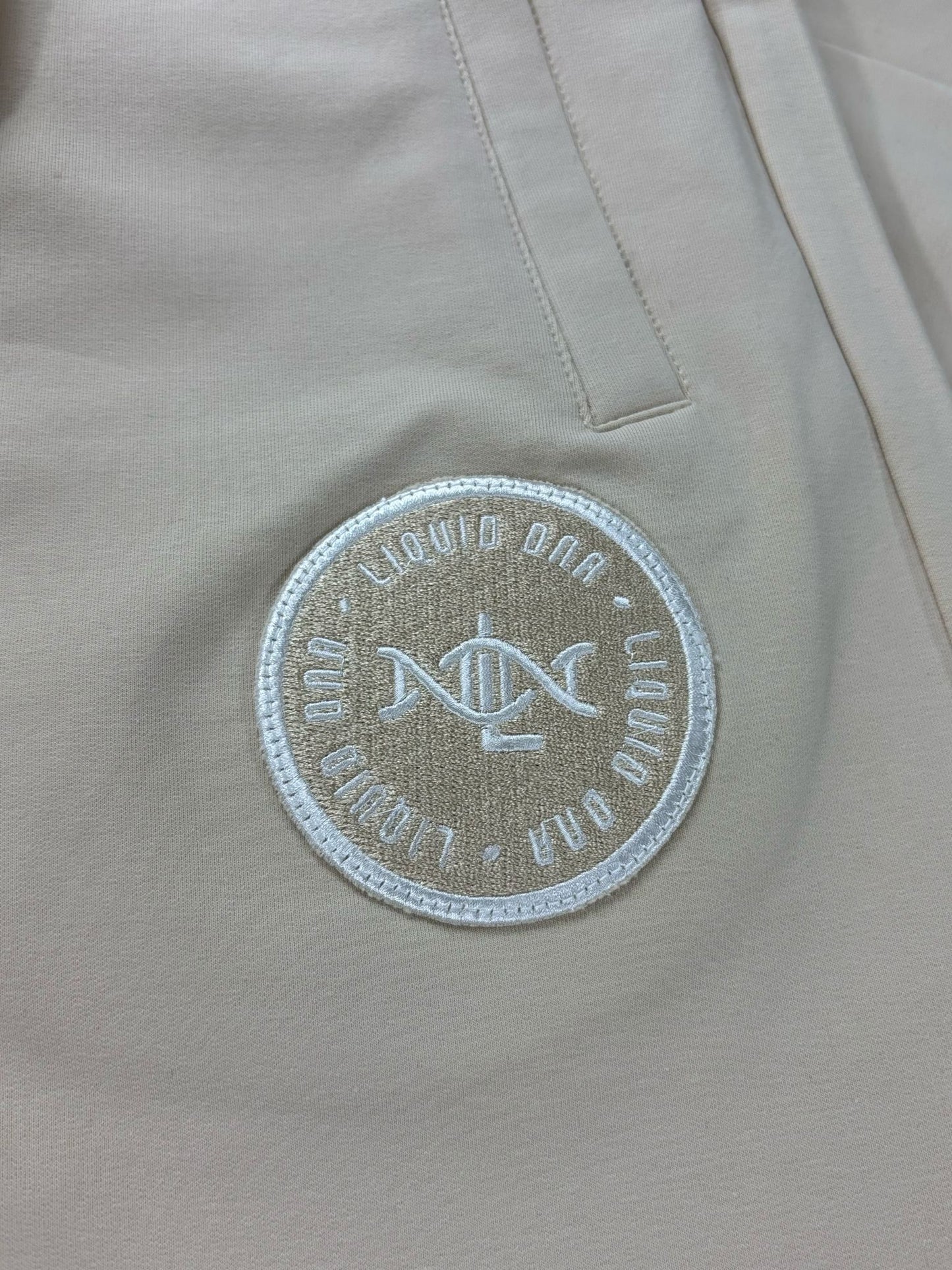 Liquid DNA Embroidery Tracksuit Cream