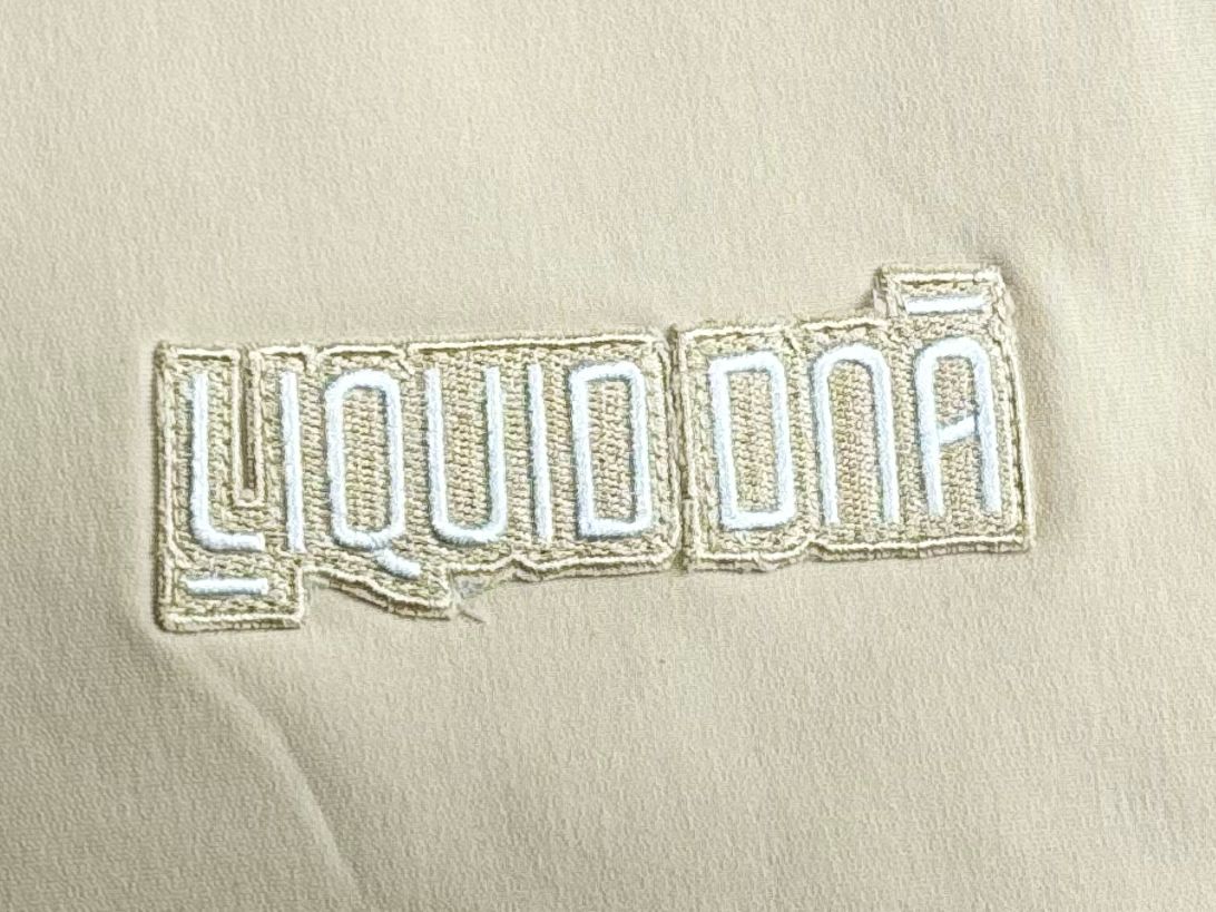 Liquid DNA Embroidery Tracksuit Cream